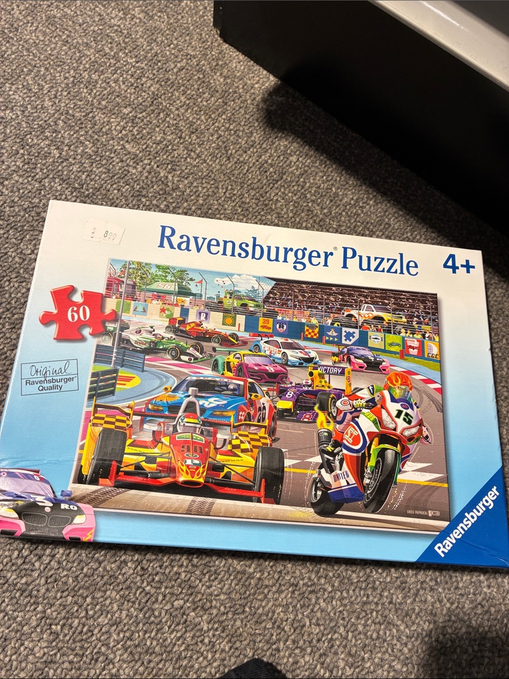 Ravensburger Racing Puzzle – Blue Box with Red, Yellow & Green Vehicles